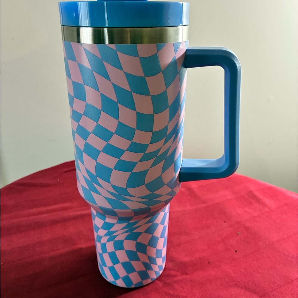Vibrant Blue and Pink Patterned Travel Mug